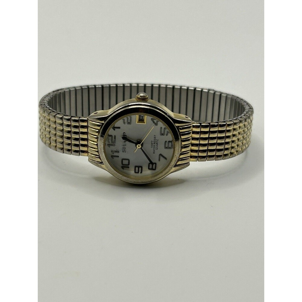 Sharp Quartz Watch Gold Tone Stretch Band White Dial With Date Keeper